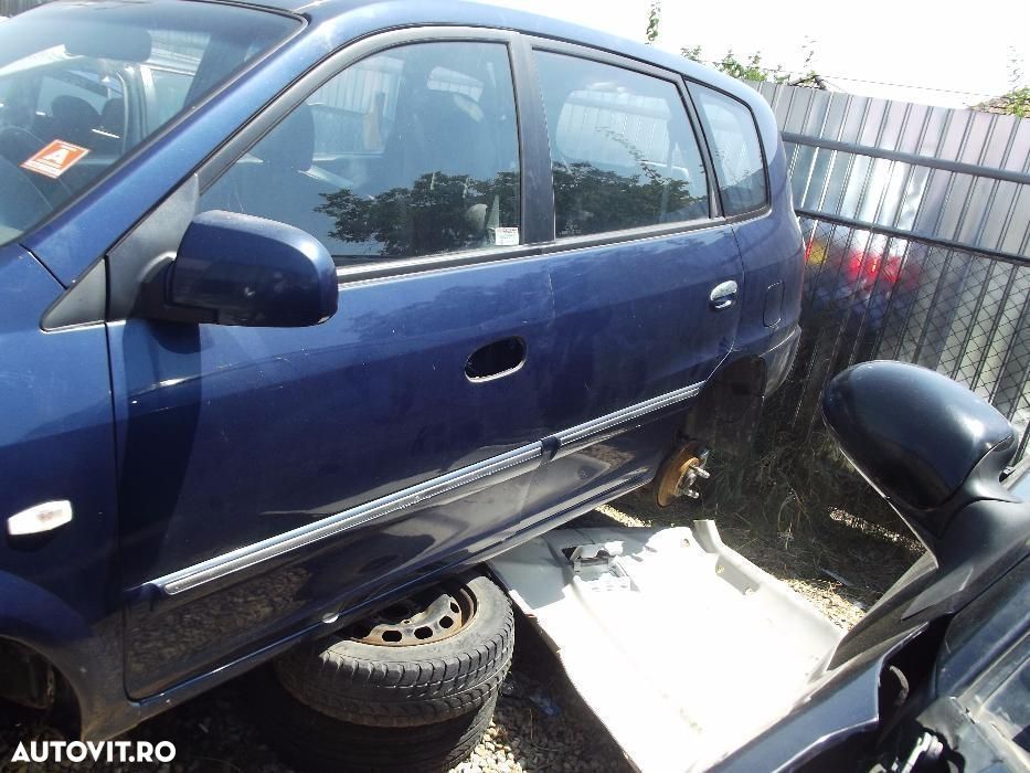 Usa Kia Carens usi fata spate Kia Carens stanga dreapta dezmembrez kia - 1