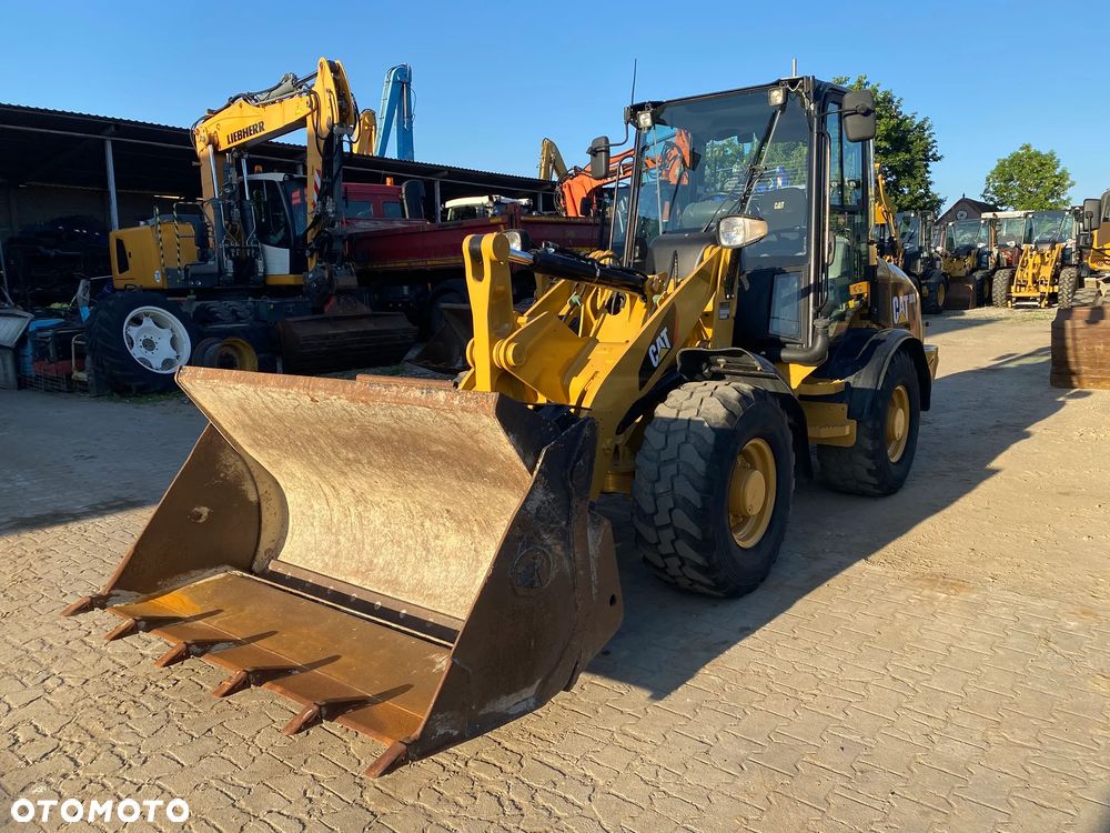 Caterpillar CAT 907H, 2012 ROK, ŁYŻKA OTWIERANA + WIDŁY, z NIEMIEC - 10