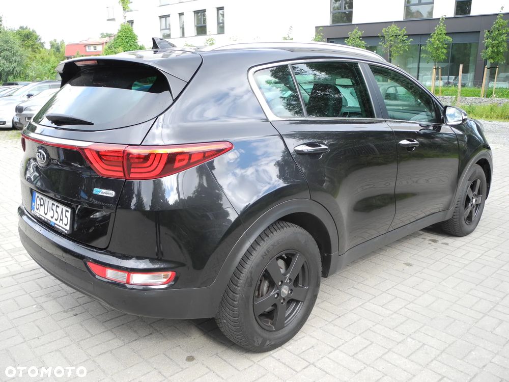 Kia Sportage - 4