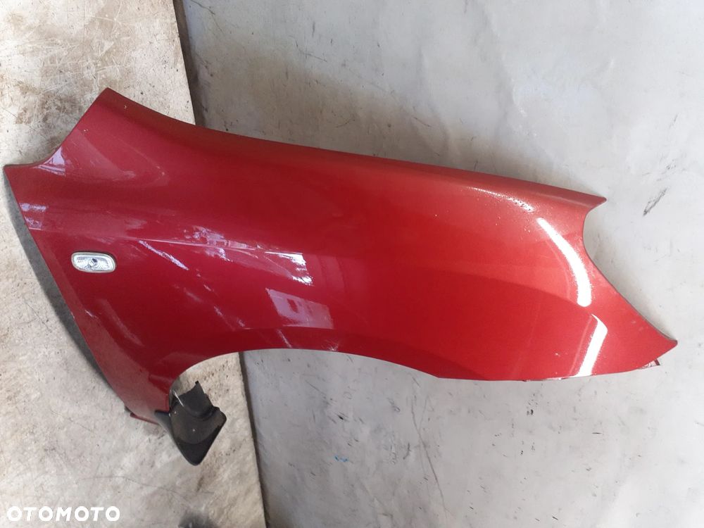 * KIA CARENS 3 III  BŁOTNIK PRZÓD PRAWY 3H WIŚNIOWY - 4