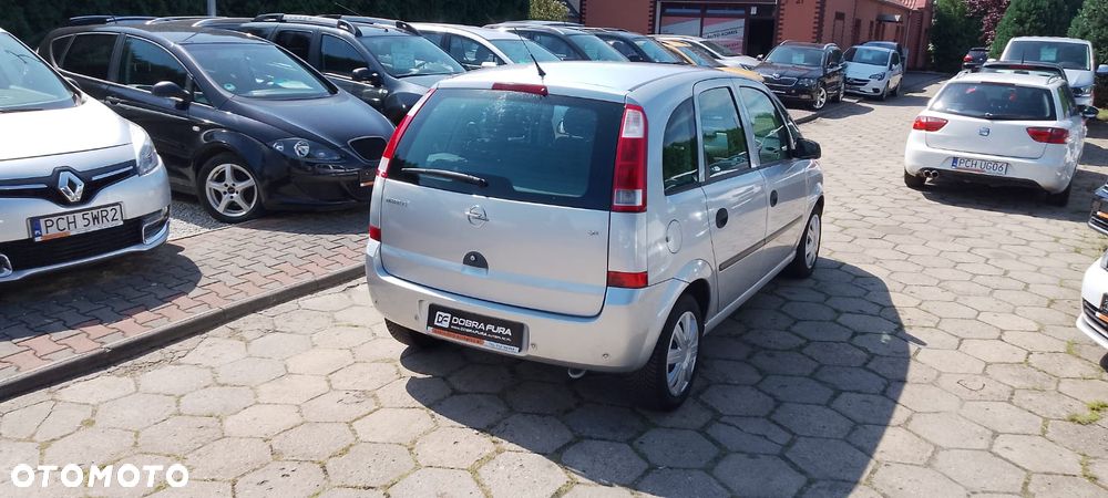 Opel Meriva ver-1-6-16v-cosmo-easytronic - 27