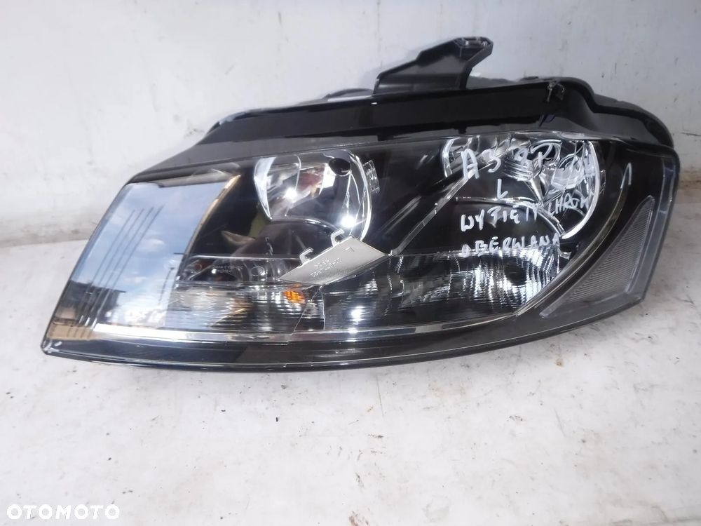 audi a3 8p lampa przód lewa przednia nowa z uszk - 1
