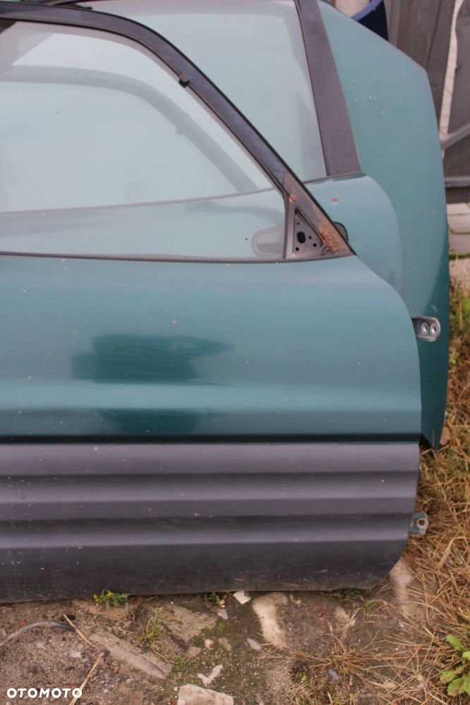 DRZWI LEWY LUB PRAWY PRZÓD TOYOTA RAV 4 I 3D - 3