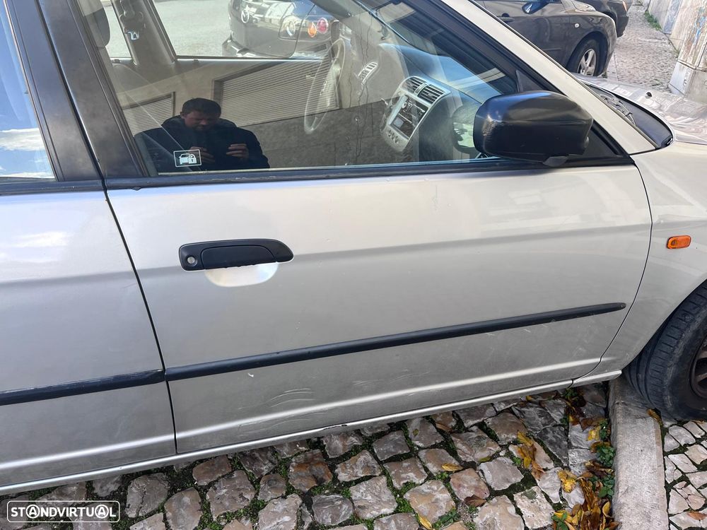 Honda Civic 1.4i Profile - 9