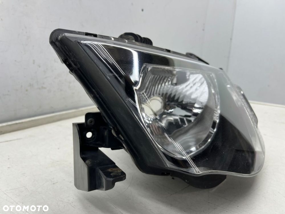 Lampa reflektor Mitsubishi L200 KA KB 05-10r. LEWA przednia H4 oryginalna lewy przód EU 8301b461 - 2