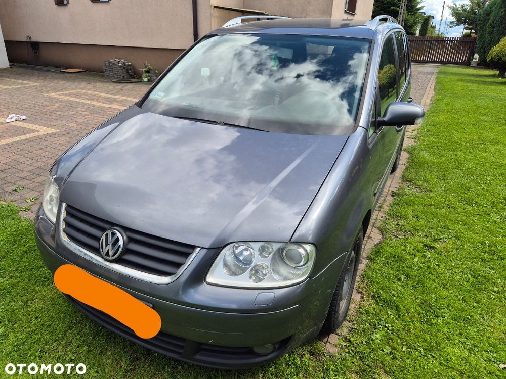Volkswagen Touran 2.0 TDI Highline DSG - 1