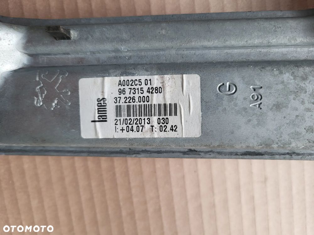 Podnośnik szyby lewy tył Peugeot 208 - 3