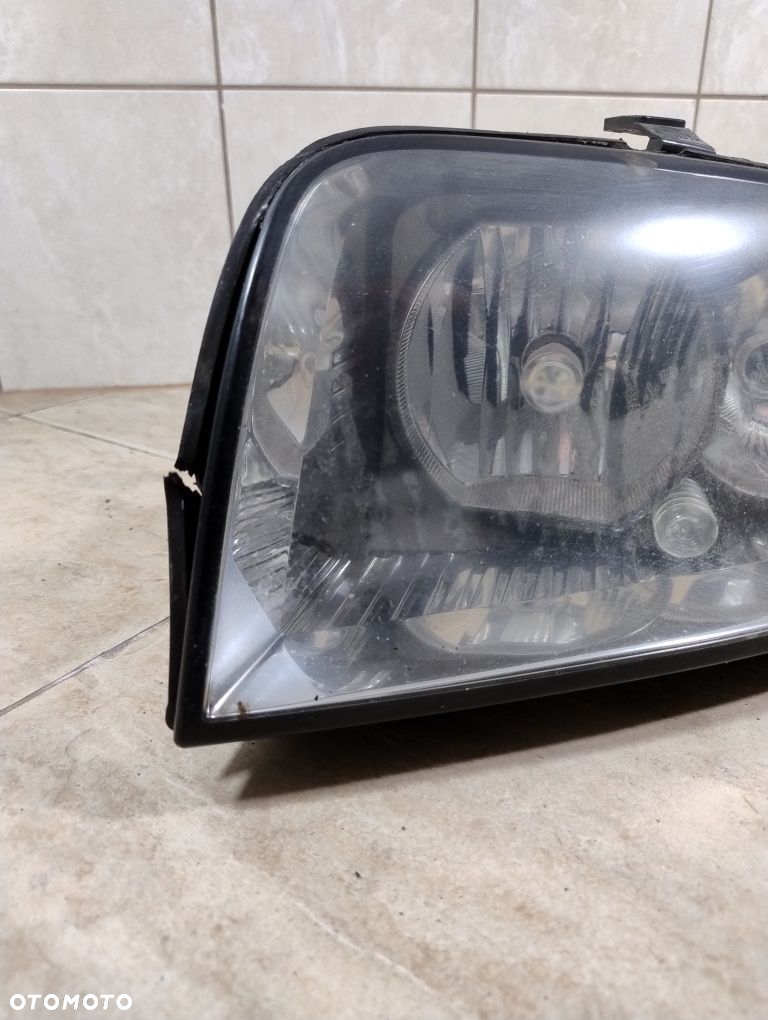 Audi a2 reflektor lampa lewa przód Europa oryginał wysyłka OLX - 2