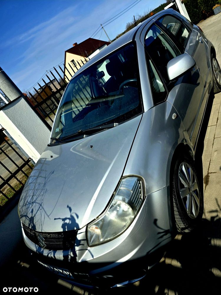 Suzuki SX4 1.6 GLX / Comfort - 1