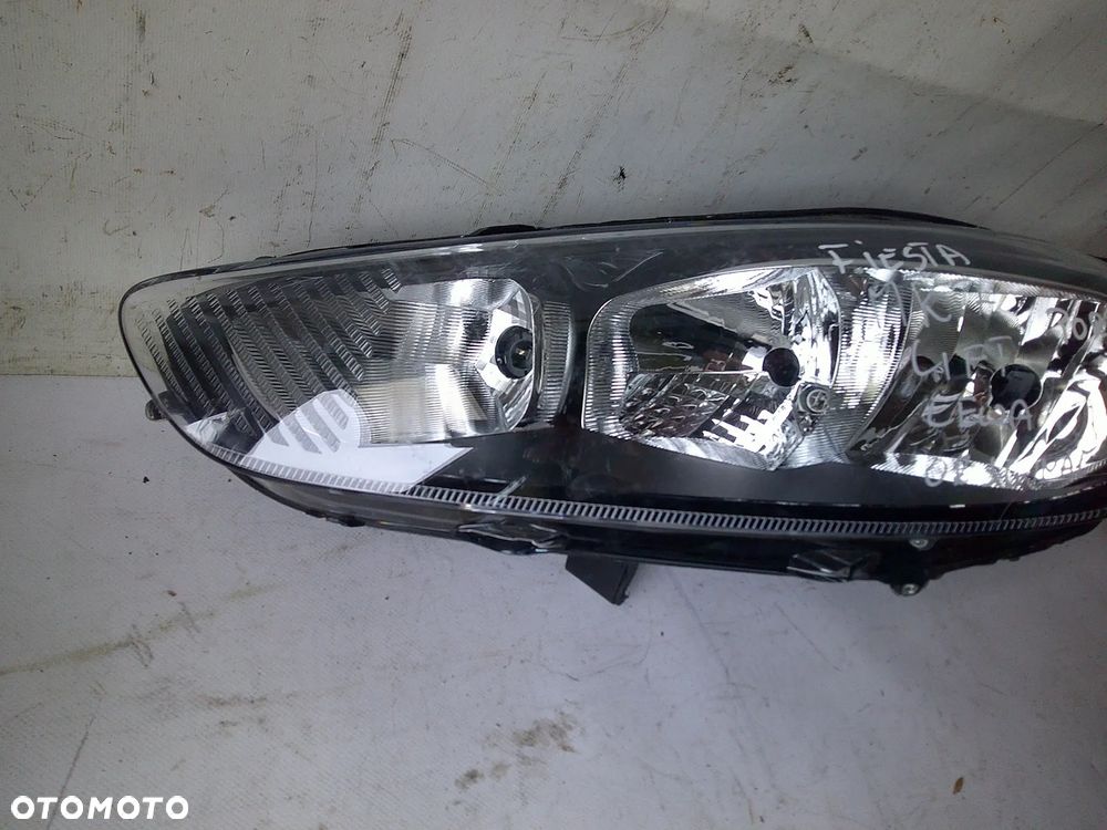 ford fiesta mk7 lampa przód lewa nowa oryg z uszk - 10