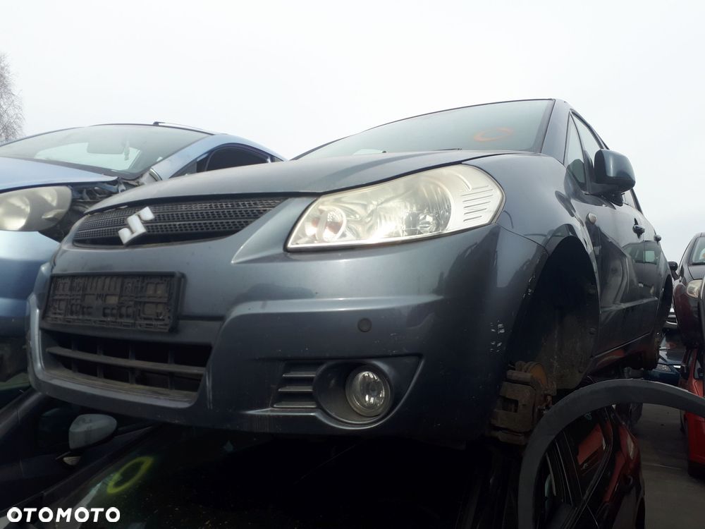 SUZUKI SX4 06-09 1.6 16V OSŁONA PRZECIWSŁONECZNA PRAWA LEWA - 4