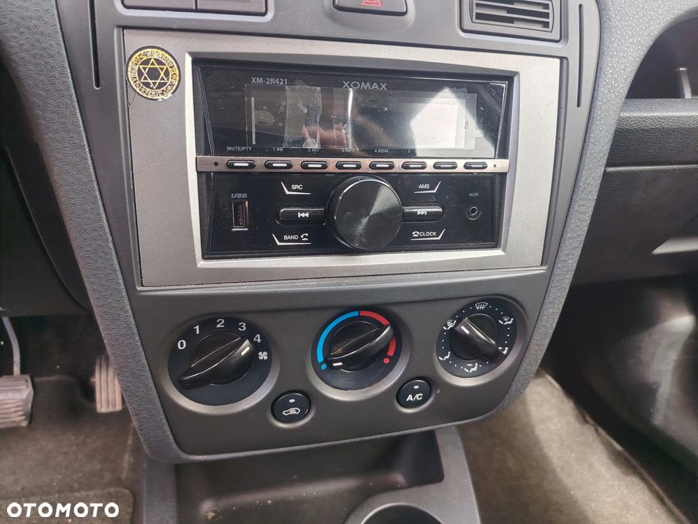 Ford Fusion 1.4 + - 16