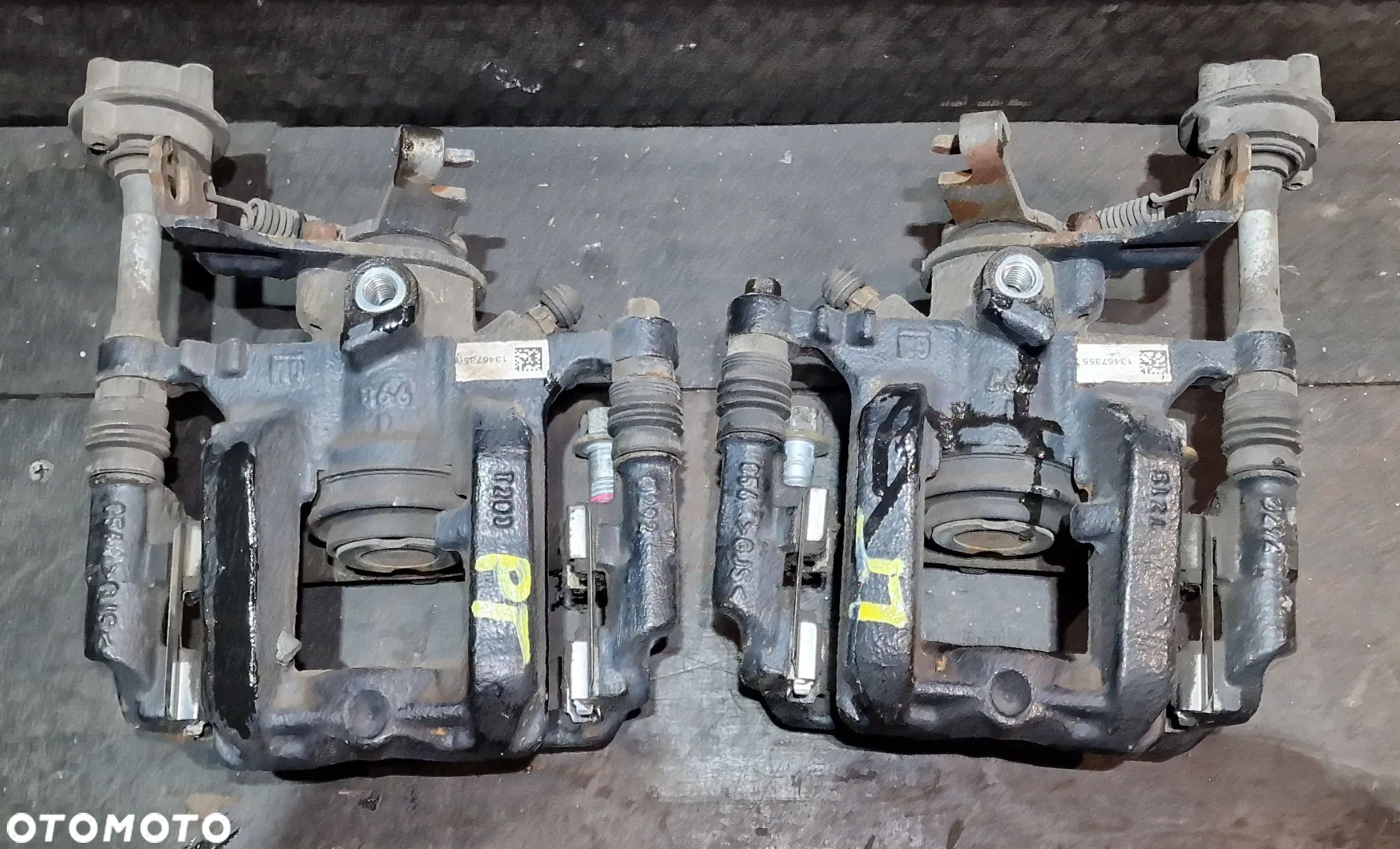 ZACISK HAMULCOWY TYŁ PRAWY LEWY 13467355 13467356 OPEL ASTRA IV J GTC OPC 1.6 T - 1