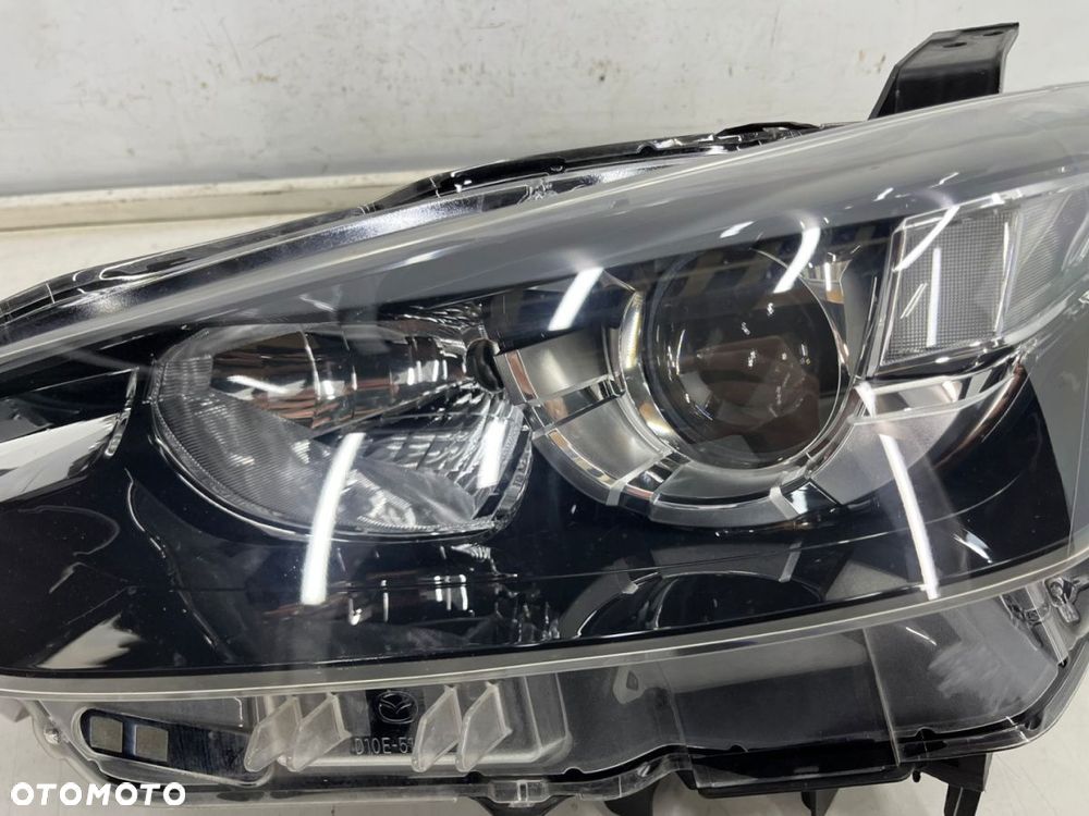 Lampa reflektor Mazda CX3 CX-3 14-21r. lewa przednia SOCZEWKA lewy przód zwykła d10e-51040 - 8