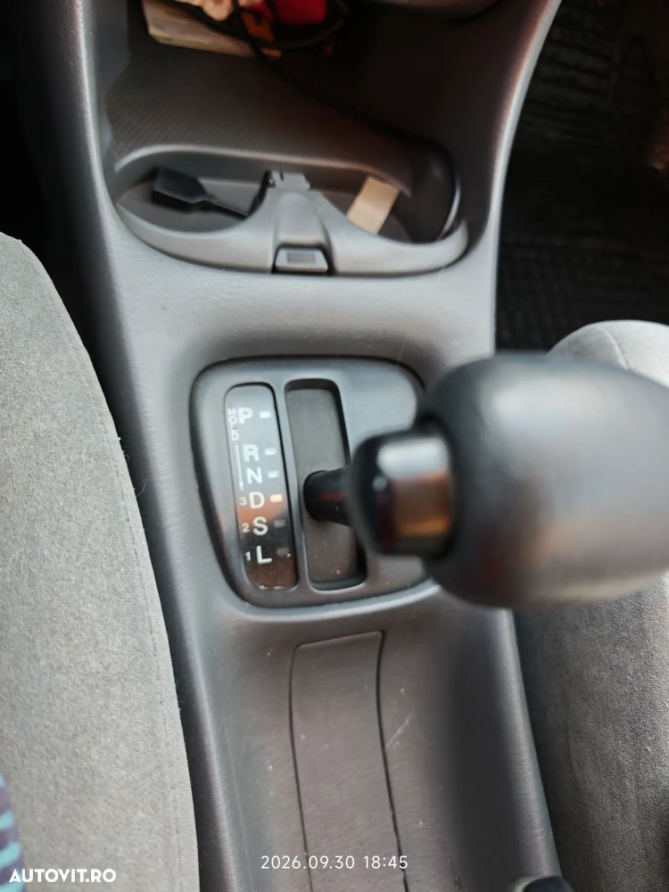 Mazda 323 - 12