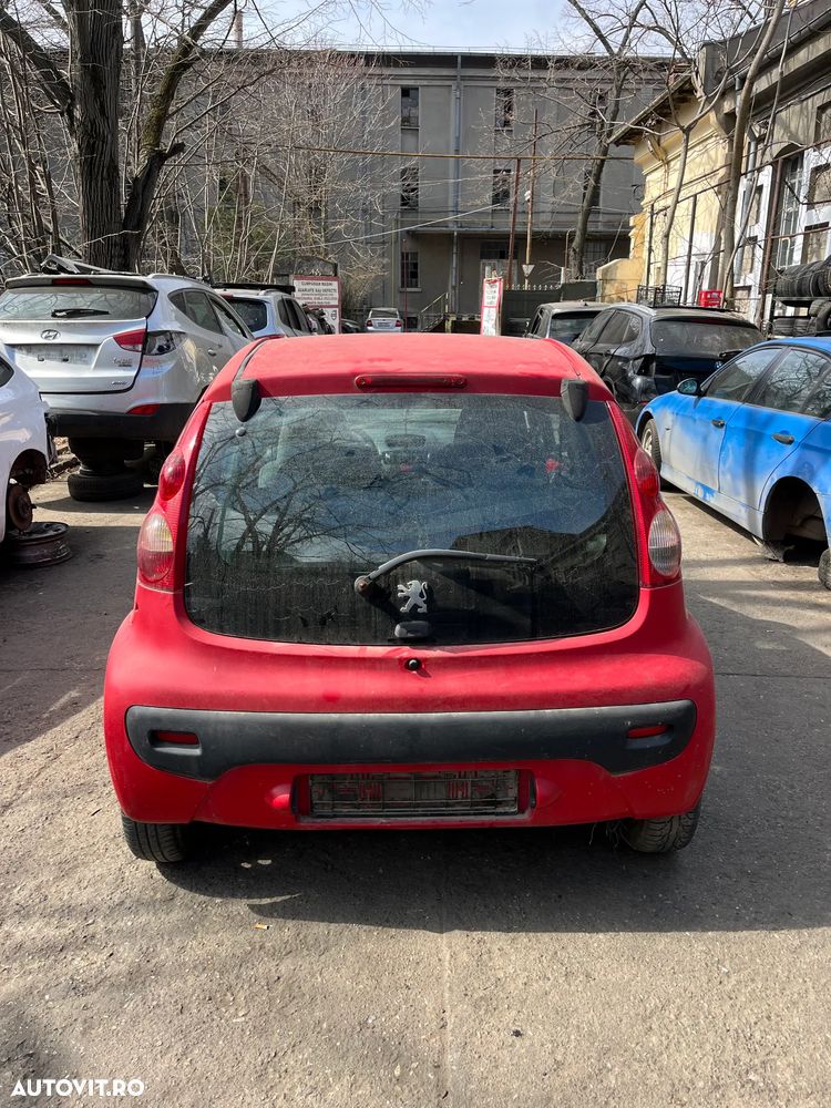 Dezmembrez Peugeot 107 rosu 2007 1.0 benzina 4usi - 10