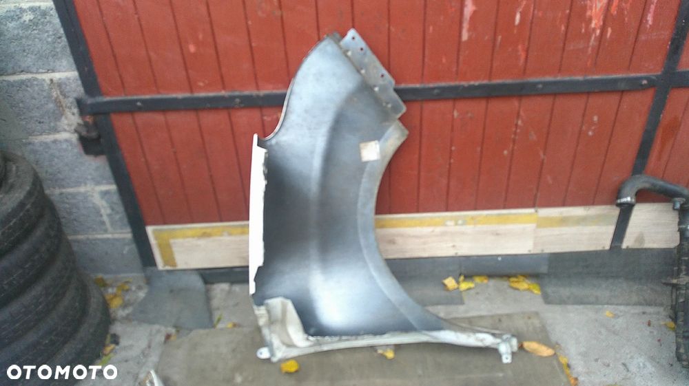 FIAT DOBLO II BŁOTNIK LEWY 249 - 4