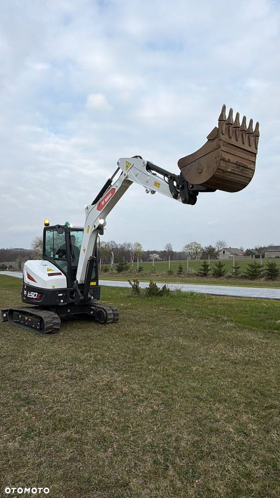 Bobcat Minikoparka Bobcat e50Z 5ton e55 e60 Cat 303.5 304  305 3xłyżki Ramię LOONG dodatkowe linie hydr wyjścia AUX1 + 2 przeciw waga MAX-dociążenie gąsienice 85% od nowości 1 właściciel z Niemiec Auto IDLEE po serwisie Widły wiertnica grabie i inne za dopłatą Szybkozłącze hydr Miller łyżka przedsiębierna Pług  Kubota Takeuchi Jcb - 24