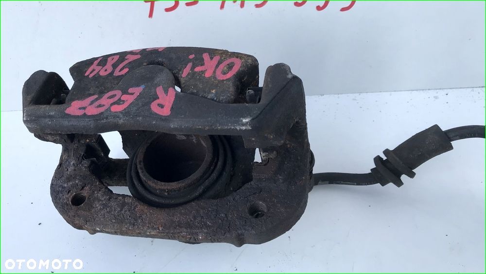 ZACISK HAMULCOWY PRAWY PRZEDNI 6774682 BMW E87 E81 - 2