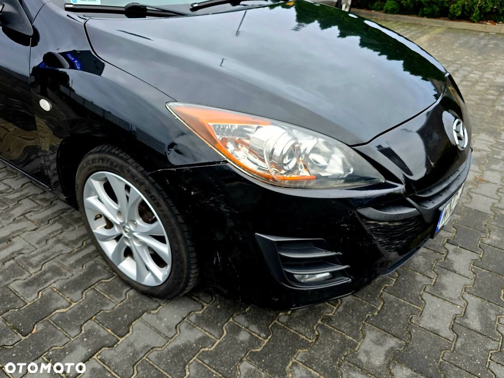 Mazda 3 2011 photo 2