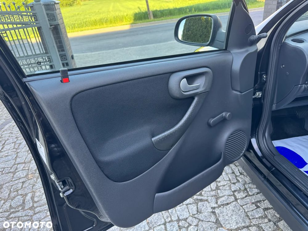 Opel Corsa 1.2 16V Enjoy Easytronic - 29