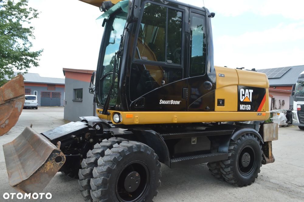 Caterpillar CAT M315D *2011* IDEALNY!!! - 9