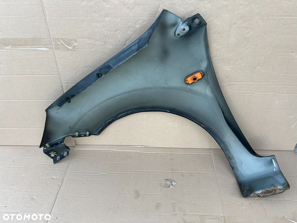 BŁOTNIK PRAWY PRZÓD FORD FIESTA MK6 5D 02- - 4