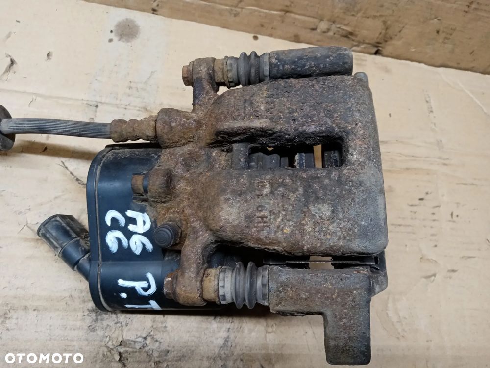 Zacisk hamulcowy lewy tył tylny Audi A6 C6 - 2