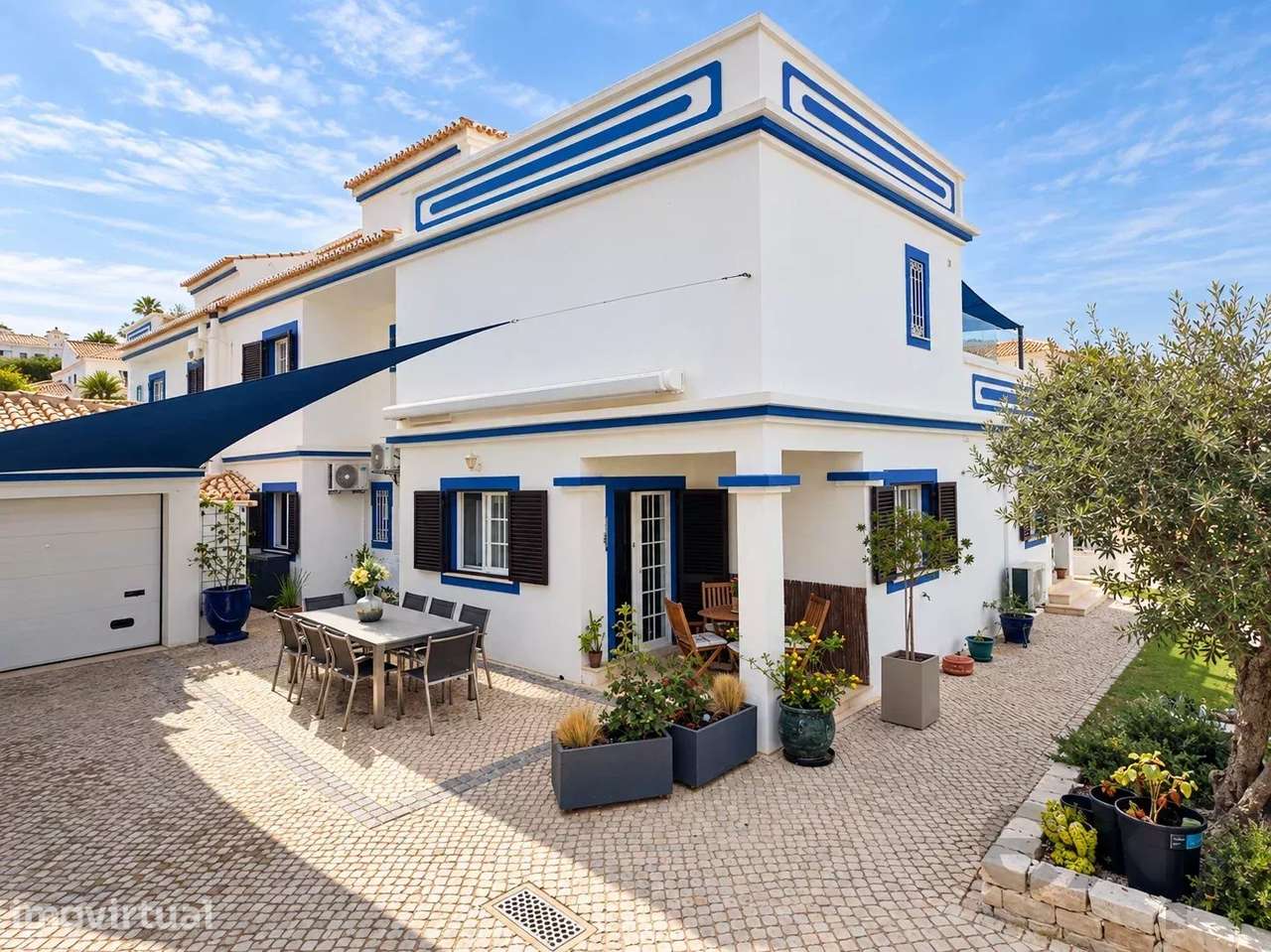 Moradia T4 – Charme e terraços com vista para a Ria Formosa - Grande imagem: 2/27