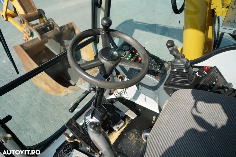 Liebherr A314 LITRONIC / EXCAVATOR PE ROȚI / AER CONDIȚIONAT / - 32