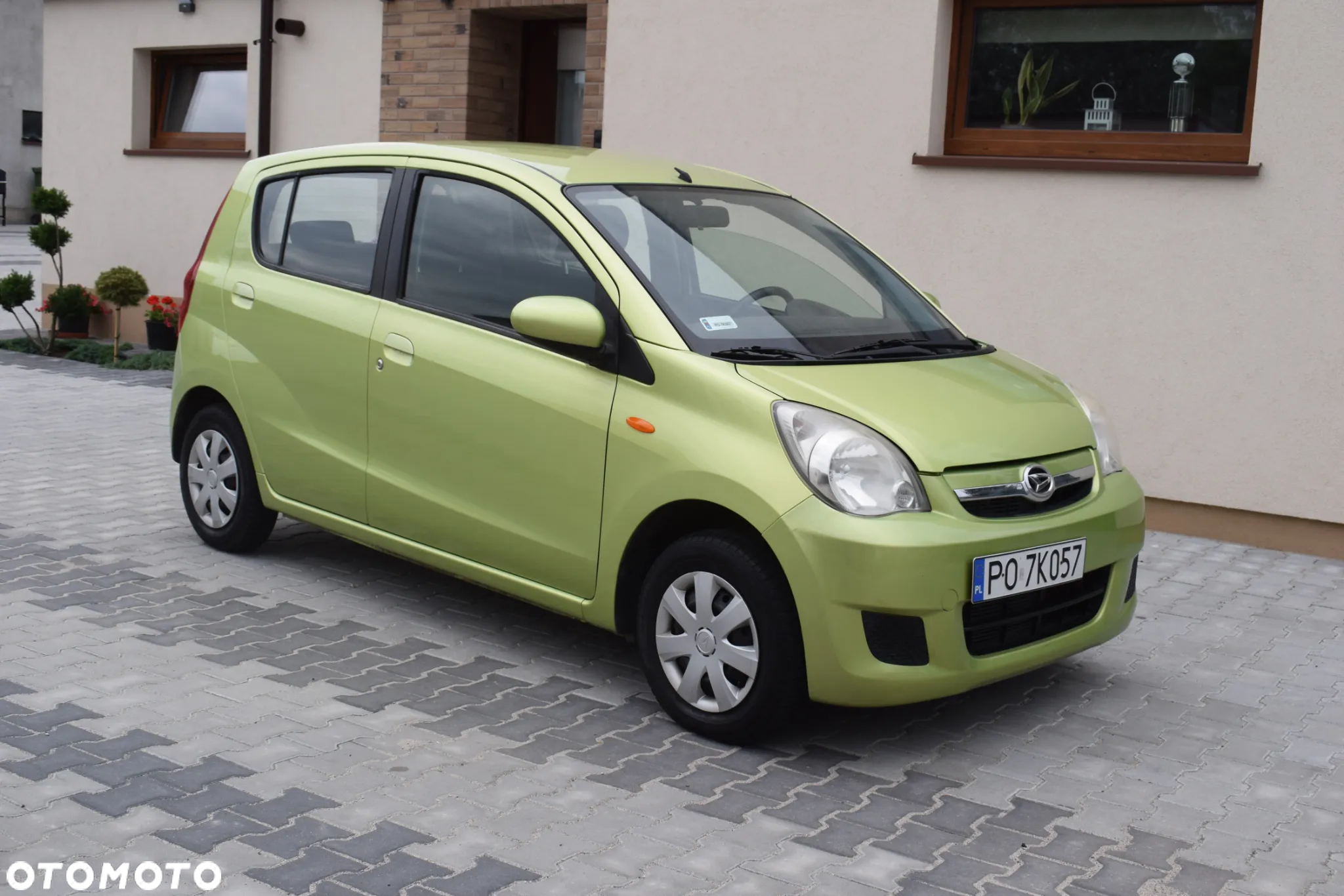 Daihatsu Cuore 1.0 Top - 10