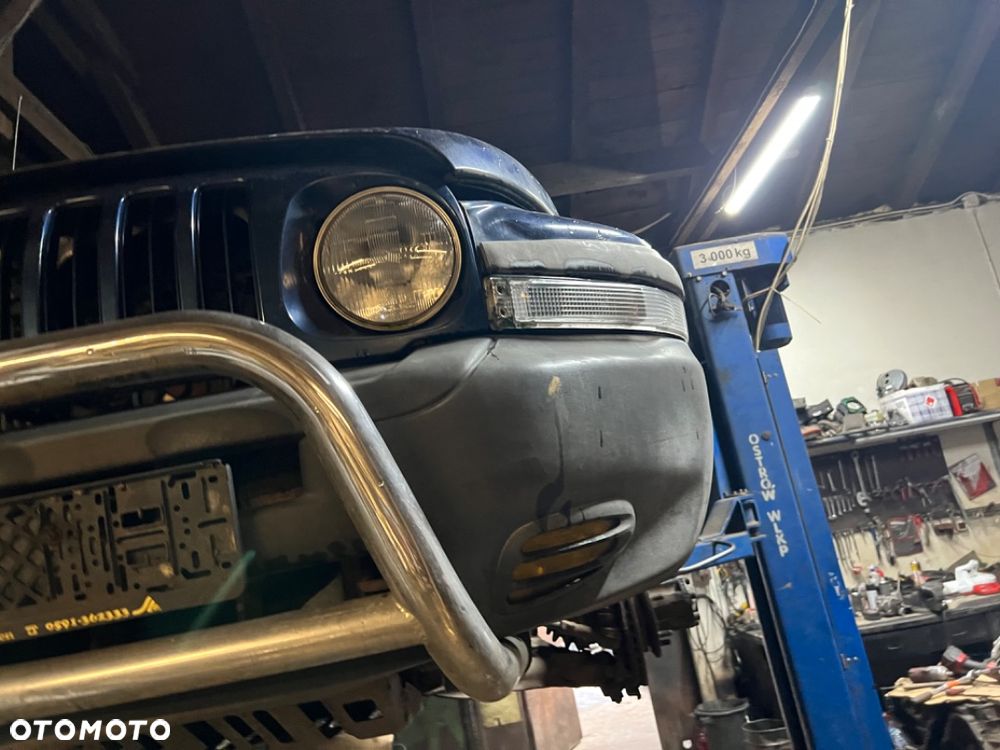 Zderzak przedni z halogenami ssangyong korando - 2