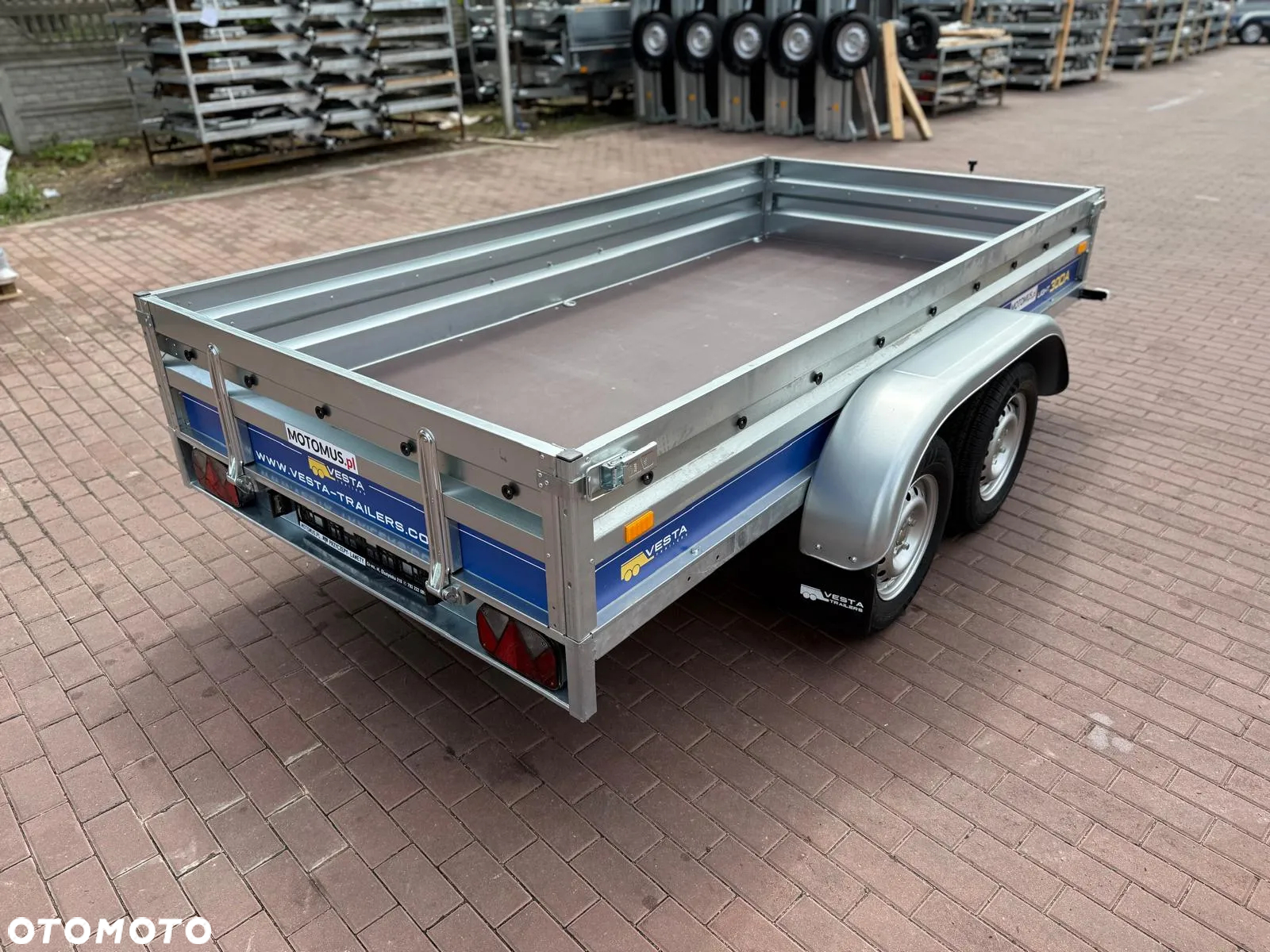 Inny Przyczepa VESTA LIGHT TANDEM 30DA 300x150x37 cm 2 osie DMC 750 kg WYSOKIE BURTY spawana rama Wrocław MOTOMUS - 9
