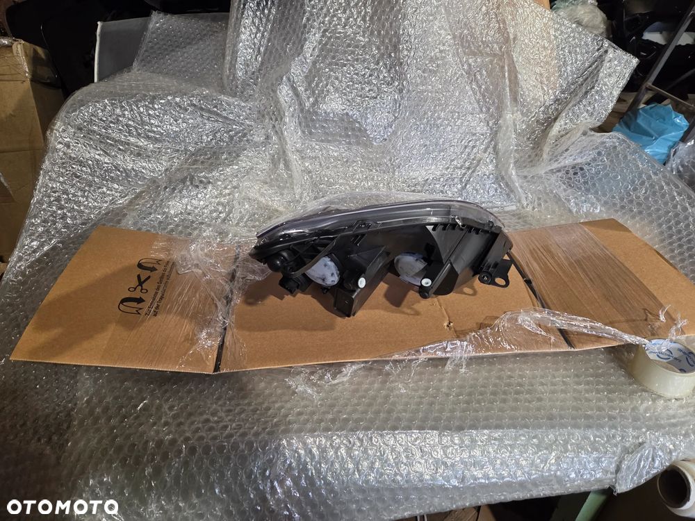 Lampa lewa przód przednia Opel Zafira B Lift 93190408 13252472 Reflektor lewy przód przedni Opel Zafira B Lift - 4