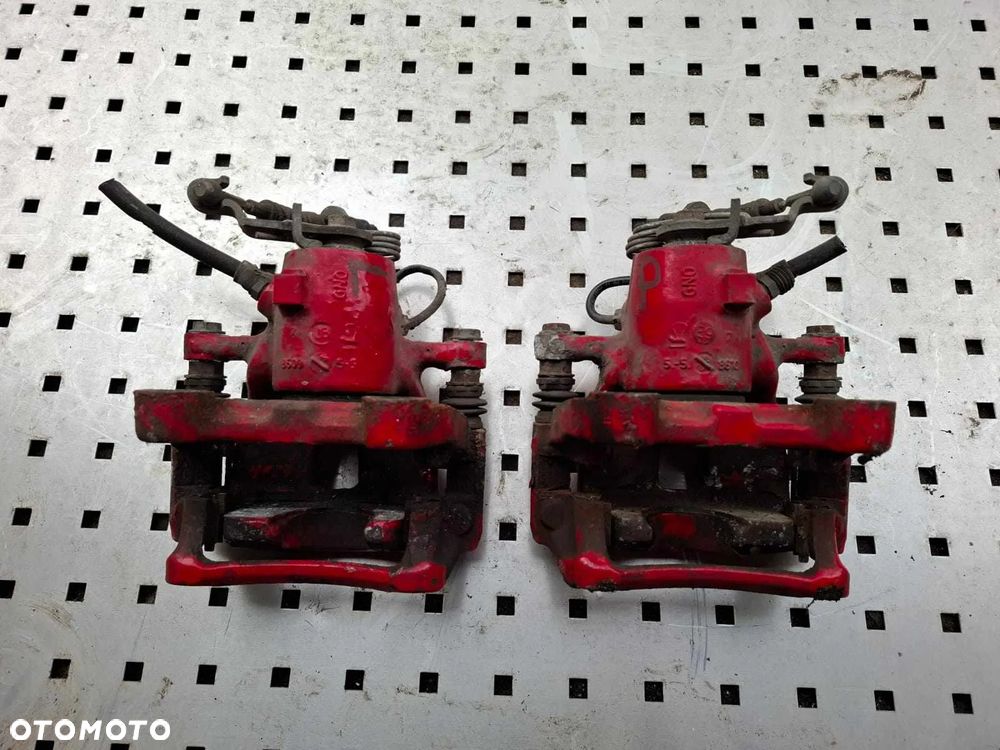 ZACISK HAMULCOWY PRAWY LEWY  TYLNY TYŁ SKODA OCTAVIA II 2,0 TDI VRS - 4