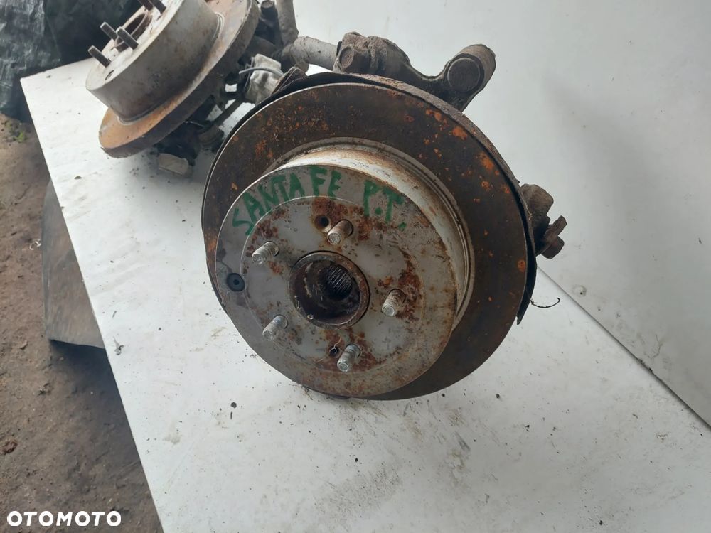 PIASTA ZWROTNICA PRAWY LEWY  TYŁ SANTA FE II 2.2 CRDI - 3