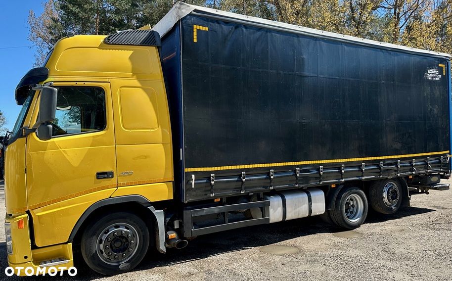 Volvo FH12 420 6x2 JUMBO OŚ PODNOSZONA ZABUDOWA FIRANKA DŁ:7.80m WINDA HYDRAULICZNA KLIMA 2xALUTANK I-SHIFT LODÓWKA 2006r WAGA:11087kg DMC:24000kg - 6