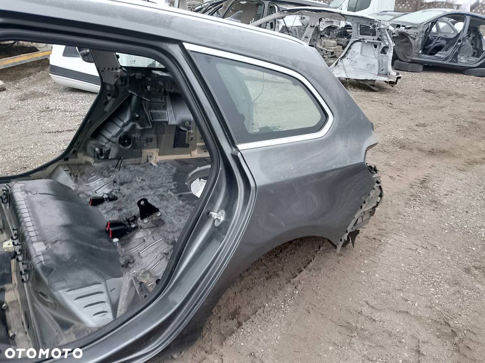 BŁOTNIK LEWY TYŁ OPEL ASTRA J Z177 KOMBI - 3