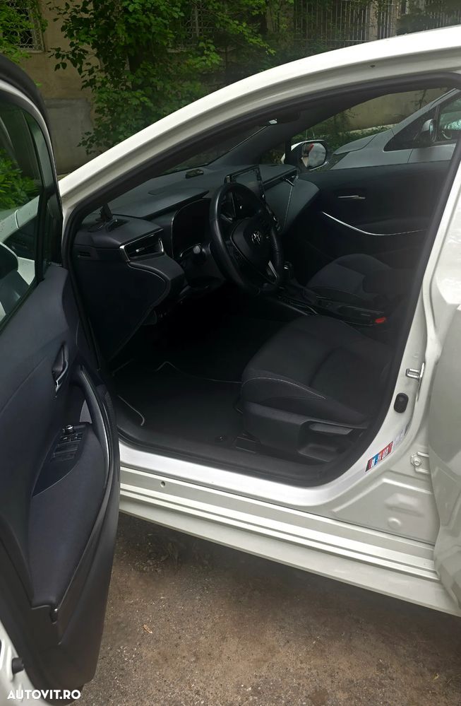 Toyota Corolla 1.8 HSD Business - 8