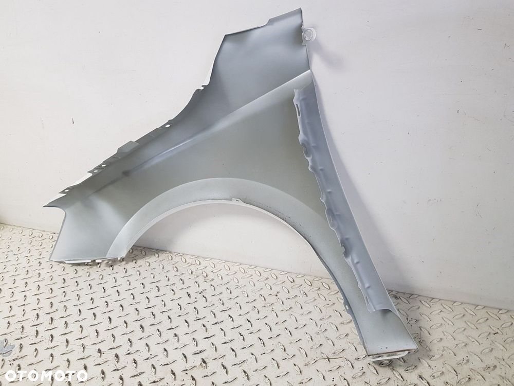 ŁADNY BŁOTNIK PRAWY PRZEDNI PRAWA PRZÓD SKODA FABIA IV 4 21-25 ORYINALNY  LB9A - 7