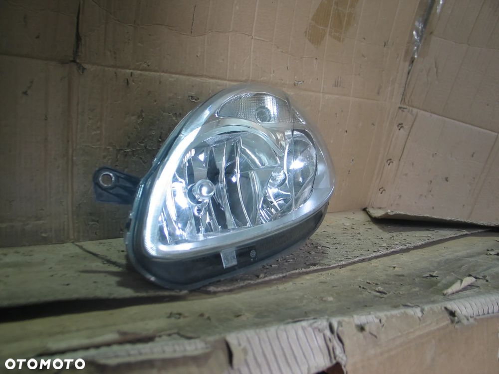 lampa przod lancia ypsilon 2 II lift 06-11r. oryginal europa - 6