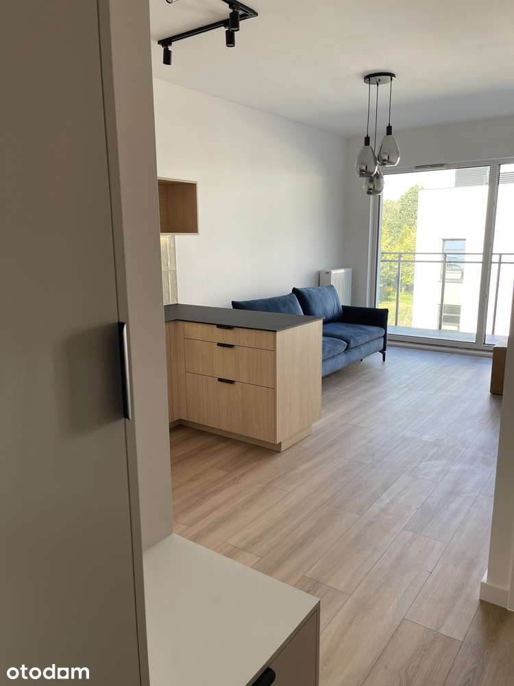 Nowe mieszkanie z balkonem i garażem podziemnym w pięknym otoczeniu