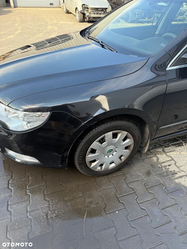 SKODA SUPERB II 9910 BŁOTNIK LEWY PRZÓD PRZEDNI - 1