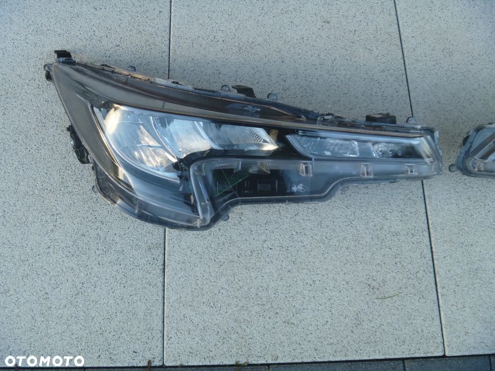 TOYOTA COROLLA E21 HB KOMBI ATRAPA ZDERZAKA PRZEDNIEGO+PODSTAWA - 10