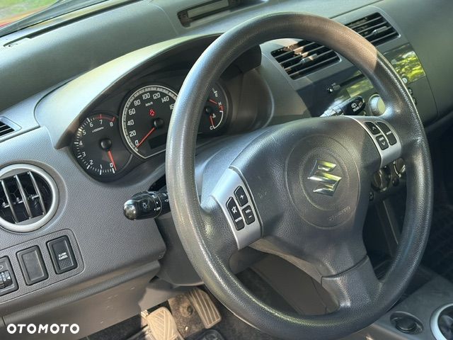Suzuki Swift 1.3 Sakura - 13