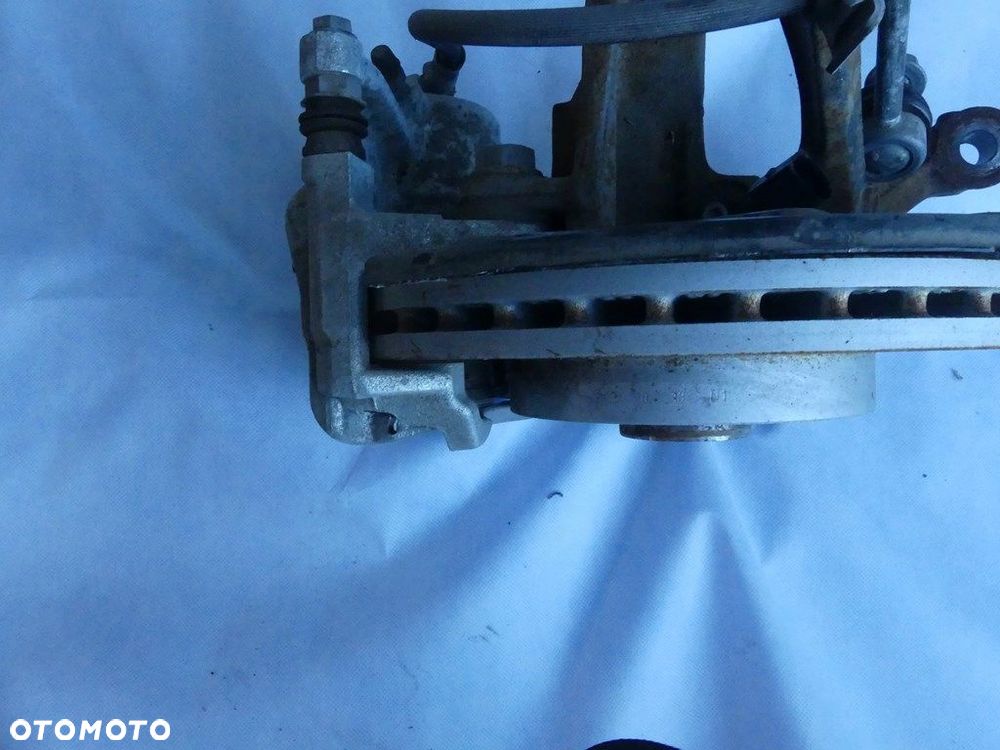 DW GOLF 7 MCPERSON PIASTA ZWROTNICA TARCZA ZACISK 5Q0413023 20 km. - 4