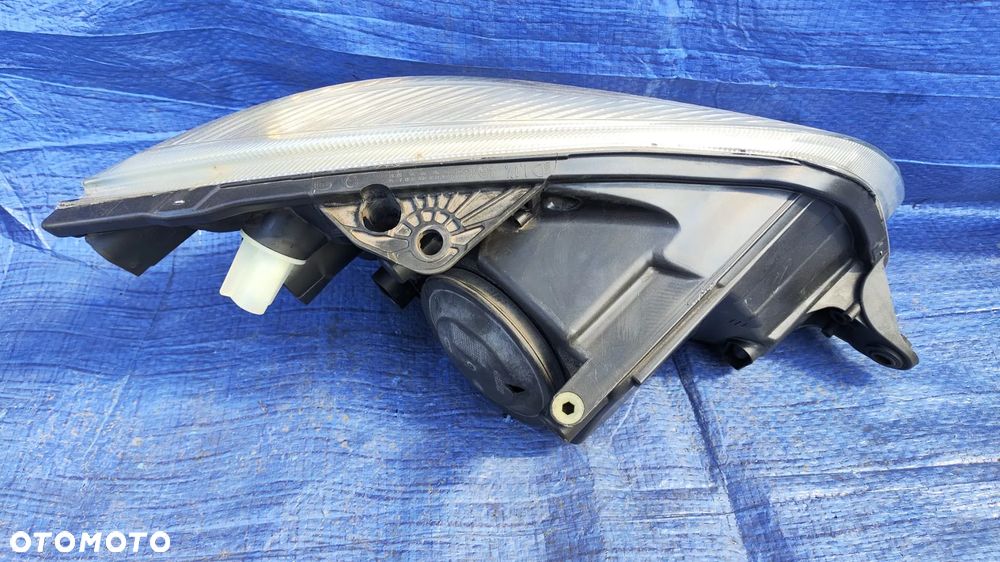 REFLEKTOR LAMPA SOCZEWKA LEWY PRZÓD HELLA EUROPA SKODA FABIA II ROOMSTER 07-10r - 2