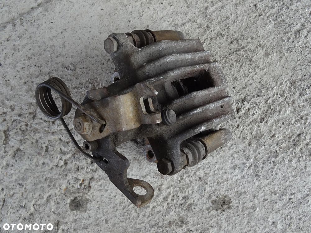 AUDI A6 C5 2,5 ZACISK HAMULCOWY HAMULCA PRAWY TYŁ 38mm - 2