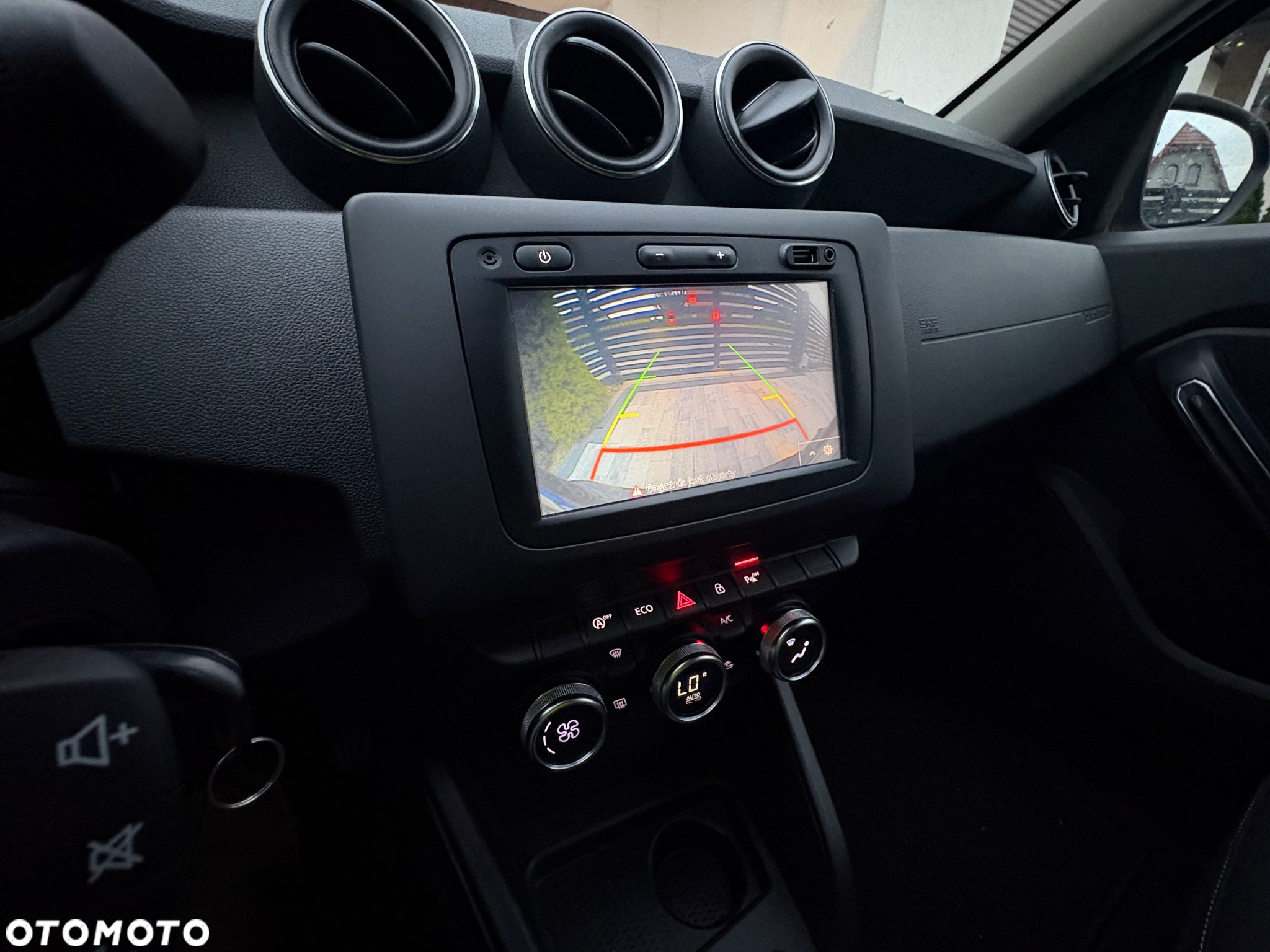 Dacia Duster 1.6 SCe Comfort - 33
