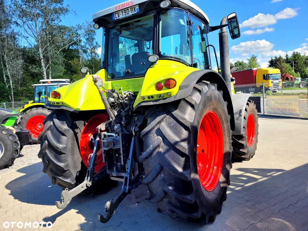 Claas ARION 640 CIS z ładowaczem FL 150 - 12